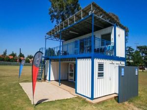 High-end shipping container clubhouse with change rooms and a shop by East Rand Containers, adaptable for schools, retail, and various applications.