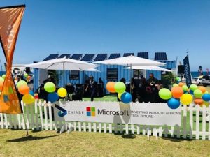 Shipping container transformed into a modern IT classroom with technology and flexible seating for enhanced learning experiences